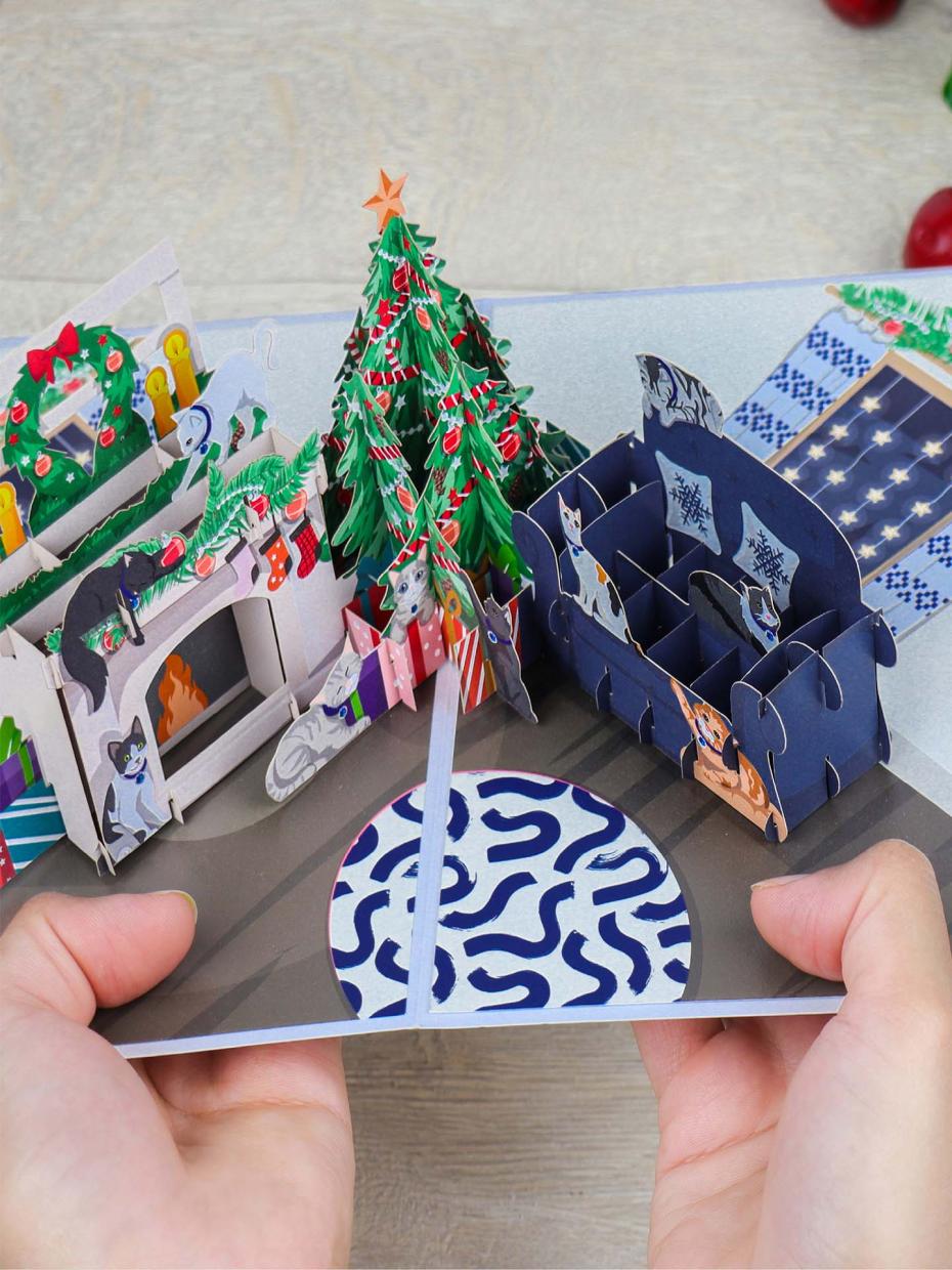 Battersea Christmas Pop Up Card For Cat Lovers  - Holding 3D Card Open